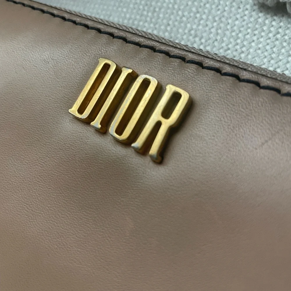 DIOR NUDE ZIP AROUND WALLET
